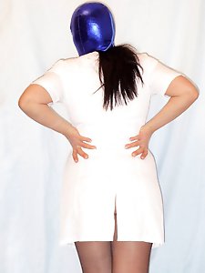 A mature woman is playing with herself in her house