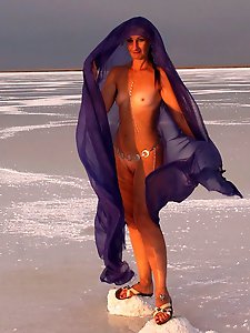 Beautiful sunset scenery by a shawl on a salt lake
