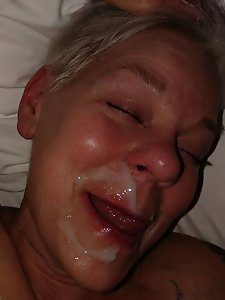 Matti by the fence, wearing a smooth cock ring, near the lake, embracing his gay identity.