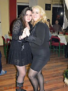 Lascivious mature businesswomen in a sex gallery