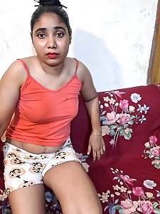 Aroused young woman is opening her vagina