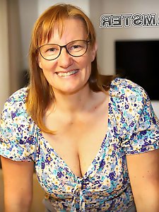 A brunette mother performs a flawless oral sex act during a gangbang