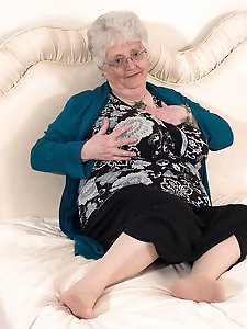 Naughty big breasted british granny getting frisky