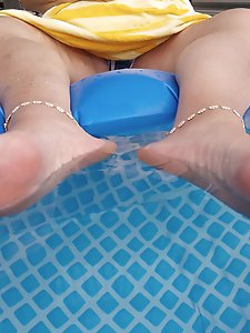 Relaxed feet in the water
