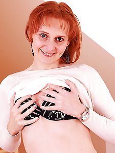 Horny red housewife playing with herself